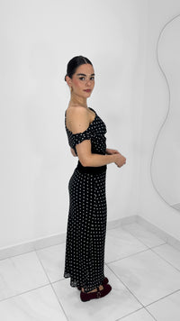 FALDA MIDI DE LUNARES NEGRA